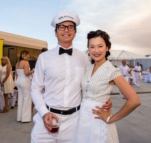 Dr. Granzow and Wife as Milkman and 50’s Housewife At Annual Charity Event
