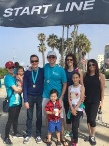 Dr. Granzow and Family Posing With Friends at Lymph Walk Start Line